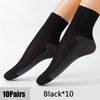 A pair of black ultra-thin breathable ankle socks shown on a foot.