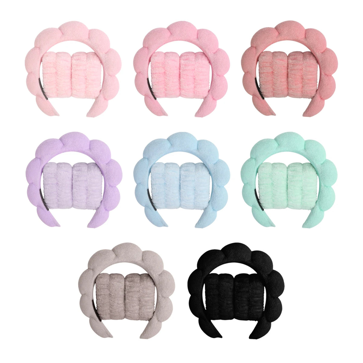 A set of nine pastel and dark colored microfiber skincare headbands and wristbands.