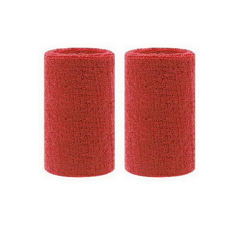 Two red dual sports wristbands rolled up and displayed side by side.