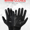 A pair of black outdoor gloves shown against a snowy background.