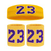 Un set de deux bandeaux de tête ou de poignet jaunes, chacun avec le numéro 23 en texte violet.