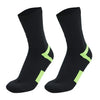 A pair of black hiking socks with neon yellow accents shown from the side.