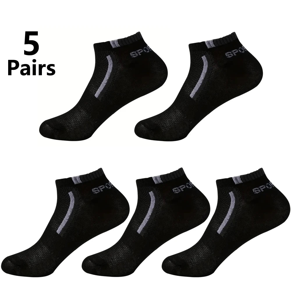 Five pairs of black mesh ankle socks displayed on a white background.