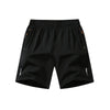 Black men's lightweight quick-dry running shorts shown flat lay