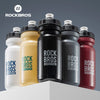 A set of five Rock Bros sports water bottles in various colors including white, yellow, black, gray, and red.