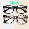 A pair of black square-framed glasses and a pair of tortoiseshell-patterned square-framed glasses.