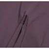 Close-up of a mauve women's high-waist flared yoga pant fabric showing a seam detail.