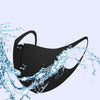 A black UV protection face mask is being washed with water, showing a repeatable water wash process.