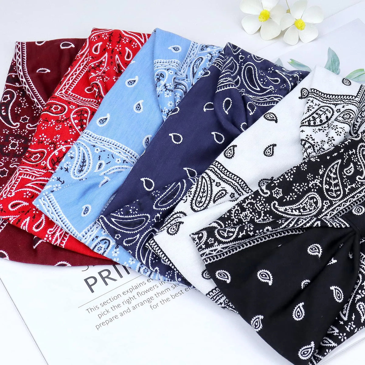 A collection of colorful boho print cotton headbands for hair and workout, featuring red, blue, and black patterns.