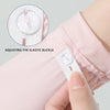 A hand is adjusting the elastic buckle on a pink UPF 50+ sun protection arm sleeve.