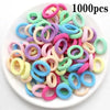 Eine große Menge von 1000 farbenfrohen Nylon-Elastikhaarbinden in verschiedenen Rosa-, Violett-, Blau- und Grüntönen.
