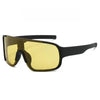 A pair of yellow-tinted sports sunglasses with black frames.