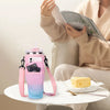 A pink and blue adjustable water bottle carrier pouch is shown next to a person reading a book.