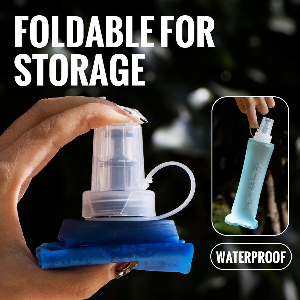 A hand holds a foldable silicone hydration flask with a blue cap and a clear bottle, demonstrating its waterproof and storage