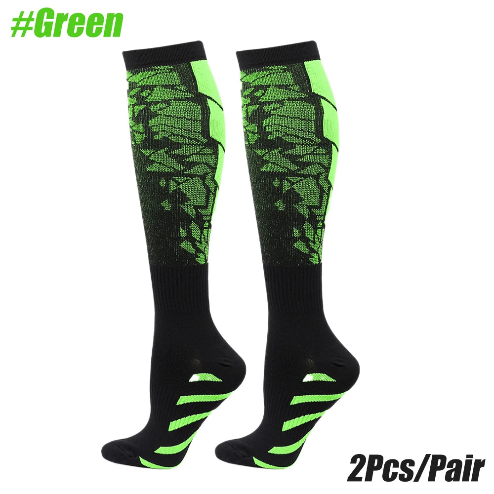 A pair of black and neon green multi-use sport compression socks.