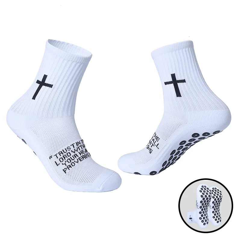 White sports socks with a black cross design and text for prayer and Christian use