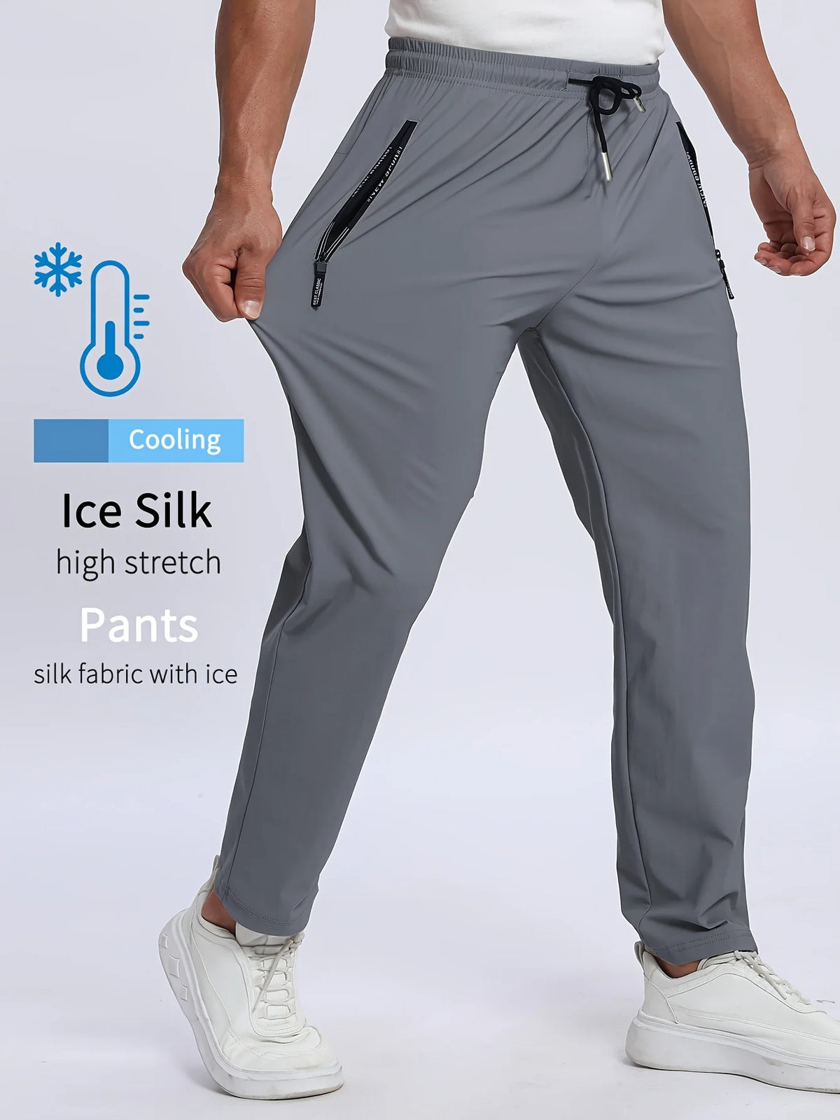 Gray Ice Silk high stretch pants worn by a man, featuring a drawstring waist and side pockets.