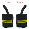 A pair of black heavy duty wrist wraps with yellow stripes shown from the side.
