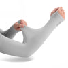 A hand is wearing a light gray summer ice silk sun protection arm sleeve on an arm.