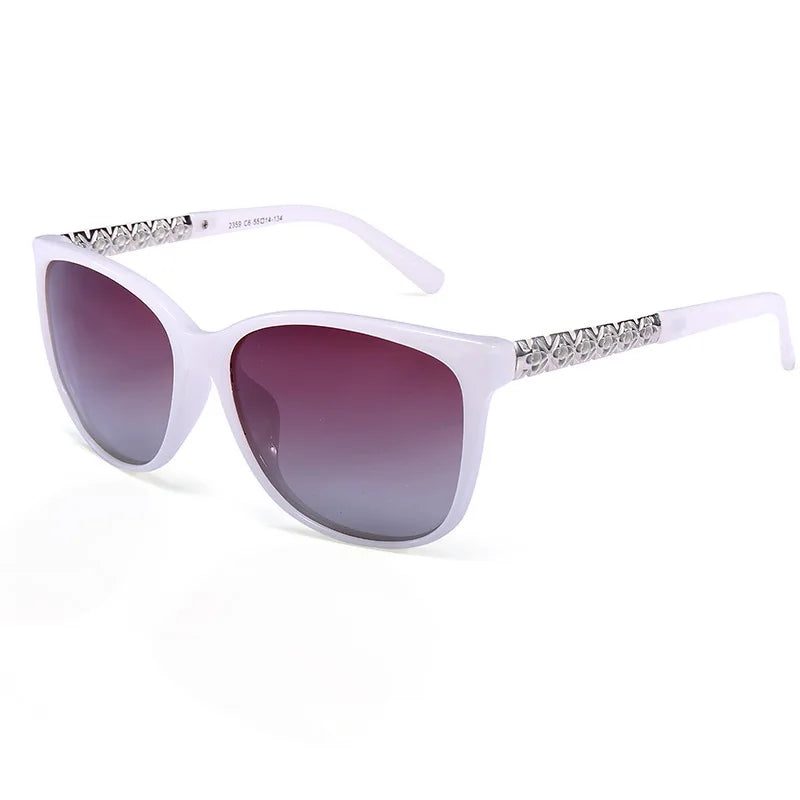 White cat eye polarized sunglasses with silver detailing and UV400 protection