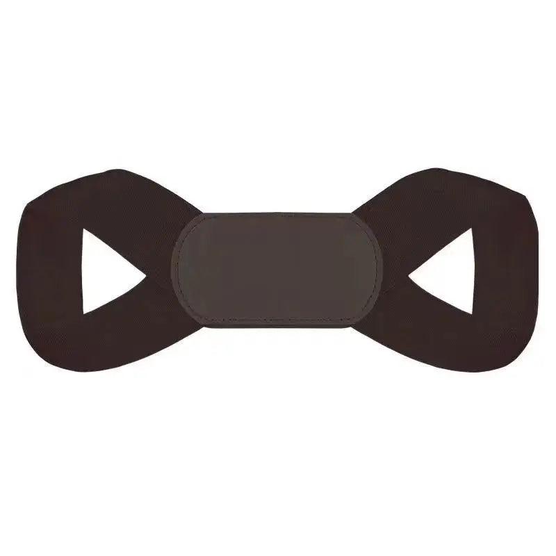 A black adjustable posture corrector belt designed for back and shoulder support.