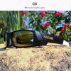 A black KDEAM C5 mirrored gold lens sunglasses resting on a textured rock outdoors.