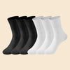 Eine Reihe atmungsaktiver, schwarz-weißer gestreifter Socken auf hellem Hintergrund.