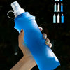 A hand holds a blue silicone water flask with a pump dispenser, showing various liquid levels.
