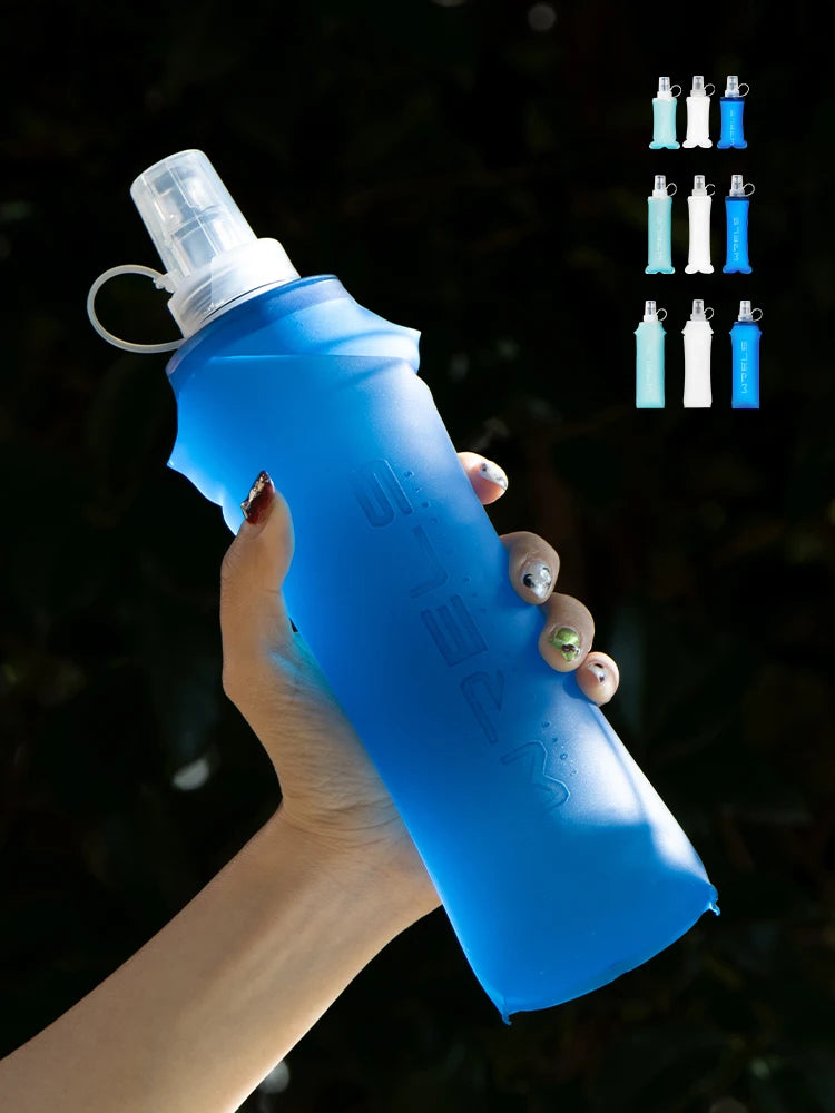 A hand holds a blue silicone water flask with a pump dispenser, showing various liquid levels.