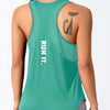A teal running vest with a black cat silhouette design on the shoulder, worn by a person.