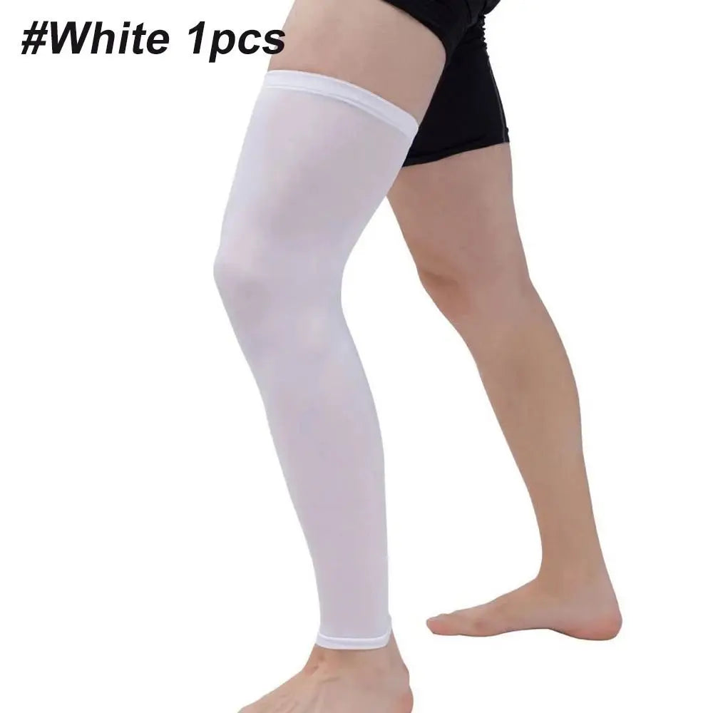 White knee calf compression sleeves worn on a leg.