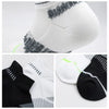 A close-up of white and gray crew socks for men showing various textures and patterns.
