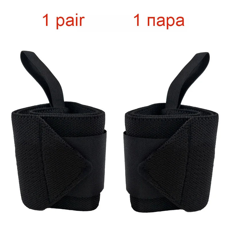 A pair of black heavy duty wrist wraps shown from the side.