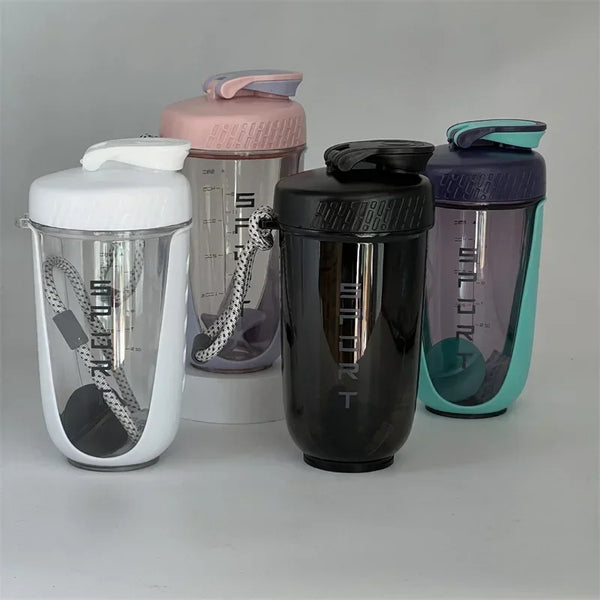 A set of four 600ml blender shaker bottles in various colors including white, pink, black, and purple.