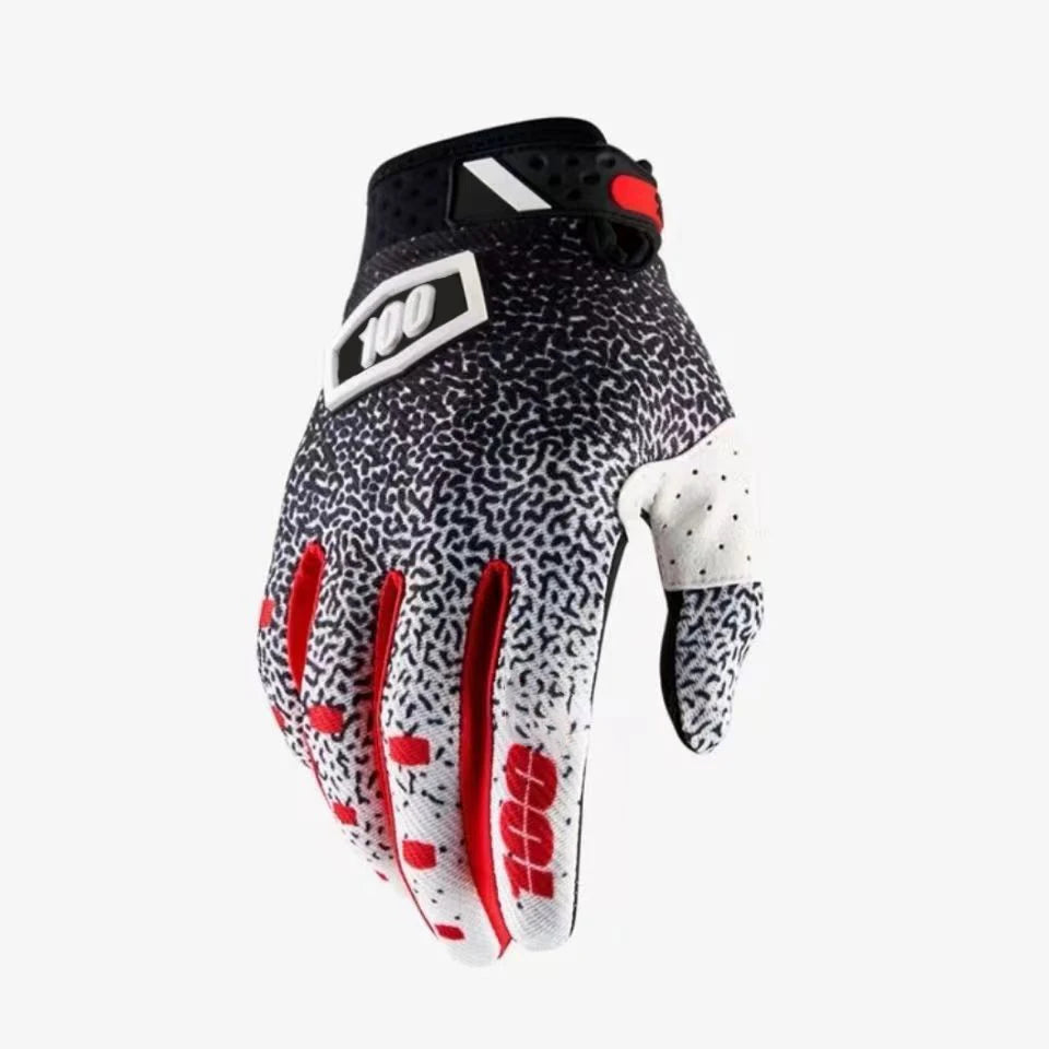A close-up view of durable motorcycle off-road cycling gloves with black and white leopard print and red accents.