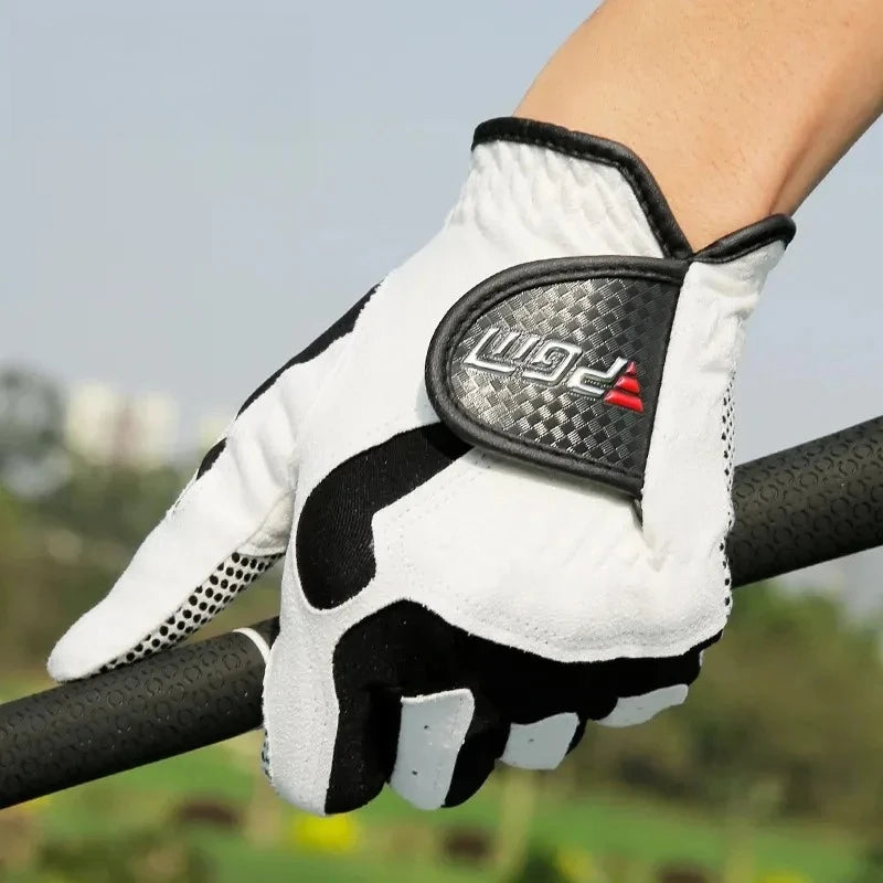 A hand wearing a white and black microfiber golf glove with a black accent palm grip.