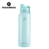 A light blue insulated stainless steel thermal water bottle with a silver cap and logo.
