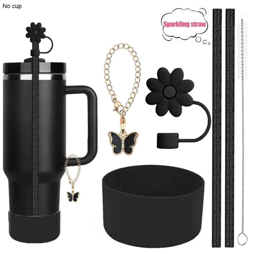 A set of six reusable accessories for a tumbler, including a sparkling straw, charm, and cleaning brush.
