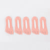 A pack of five ultra-thin, peach-colored invisible boat socks.