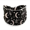 Black and white bohemian stretch cotton headband with crescent moon and leaf patterns