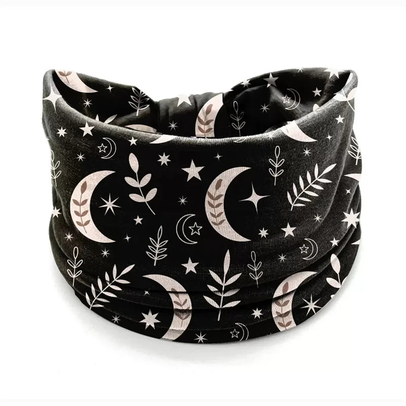 Black and white bohemian stretch cotton headband with crescent moon and leaf patterns