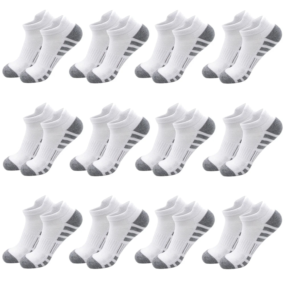 A collection of white and black athletic running socks for men and women shown in various angles.
