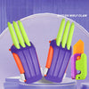 A pair of bright green carrot-shaped fidget stress relief toys with purple and orange accents.
