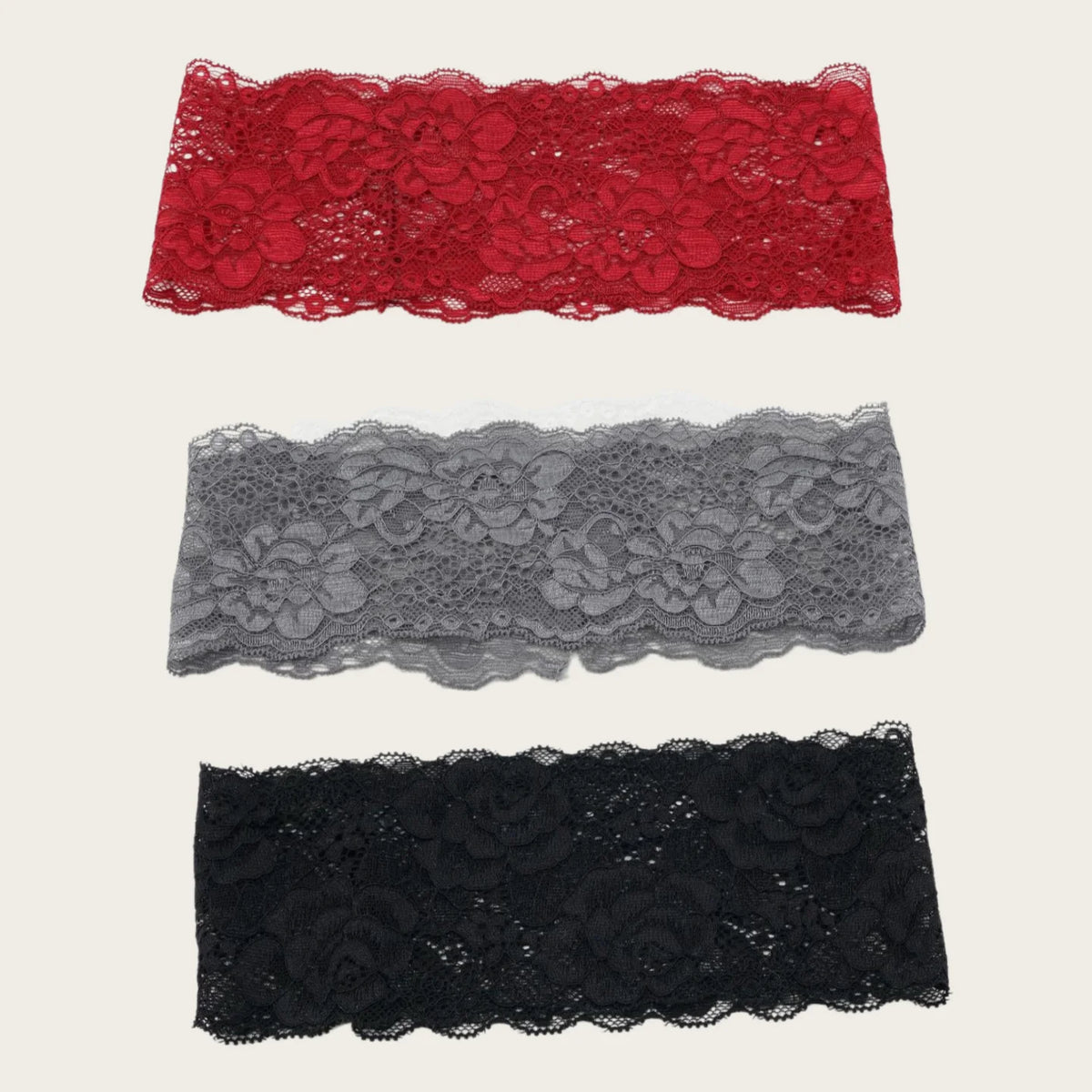 Tres capas de diademas de encaje en rojo, gris y negro para fitness y yoga