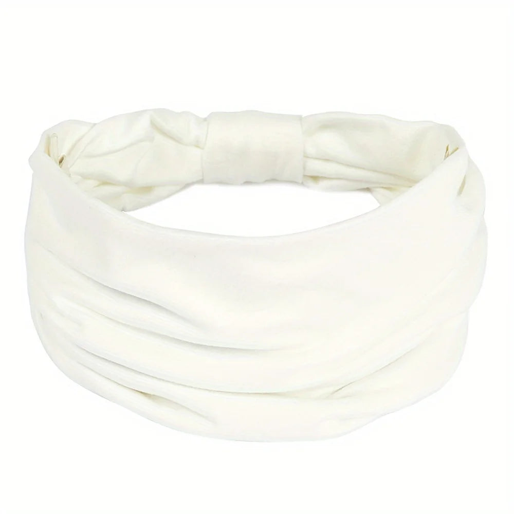 White satin fabric headband tied in a bow for fitness or hair