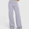 Light purple high waisted wide leg yoga pants worn by a person.