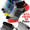 A variety of athletic knit ankle socks in various colors and patterns are displayed, including black, gray, blue, yellow, and