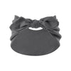 A gray bohemian bunny ear headband with a bow detail.