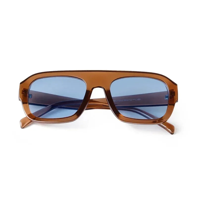 Vintage oversized square sunglasses with brown tortoiseshell frames and blue-tinted lenses