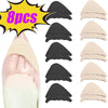 Set of eight beige and black adjustable EVA foot pads for heels and shoes